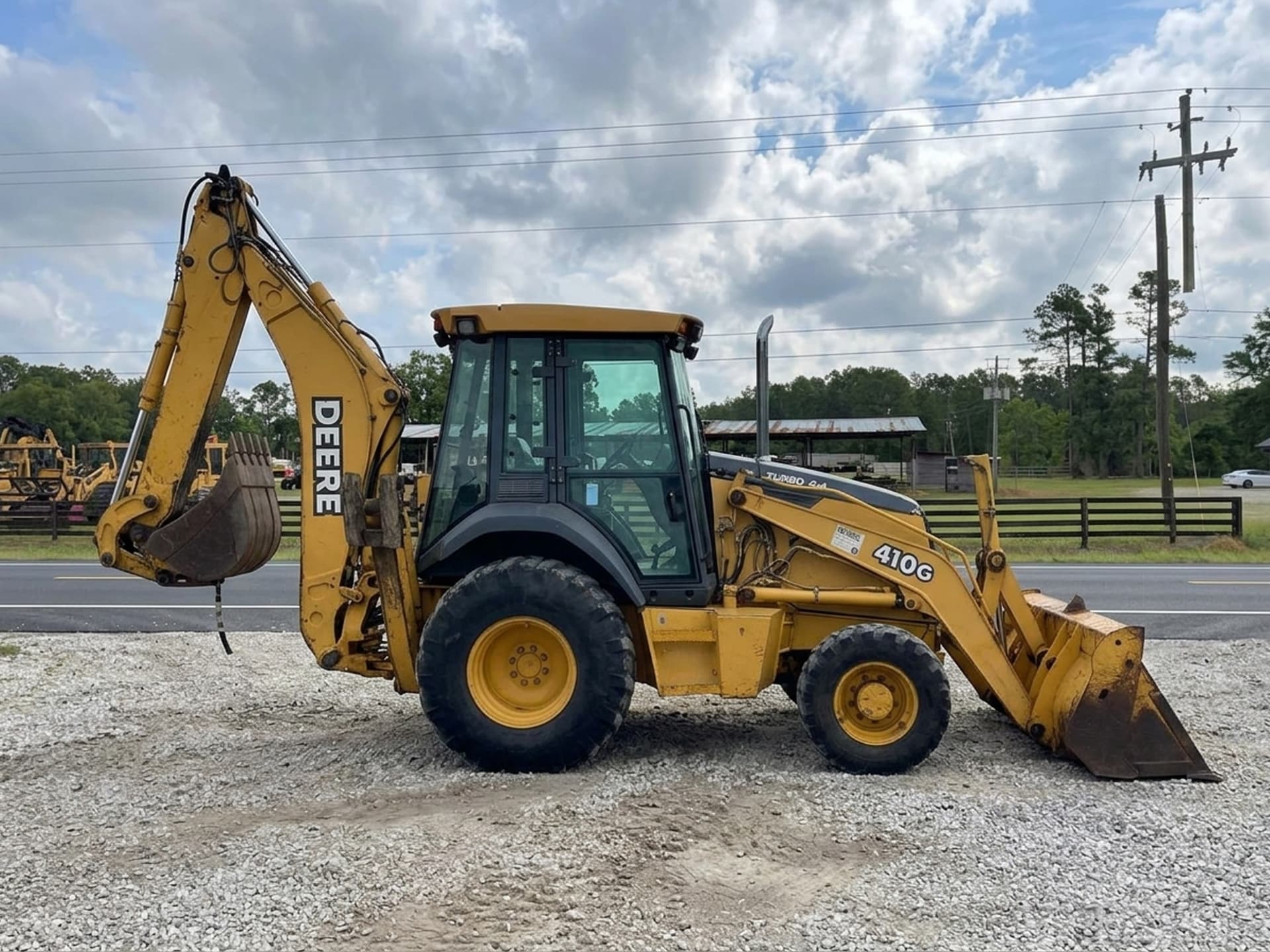 2002 JOHN DEERE 410G — photo 1