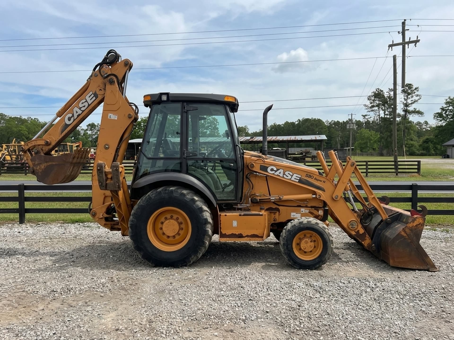 2011 CASE 580SN — photo 1