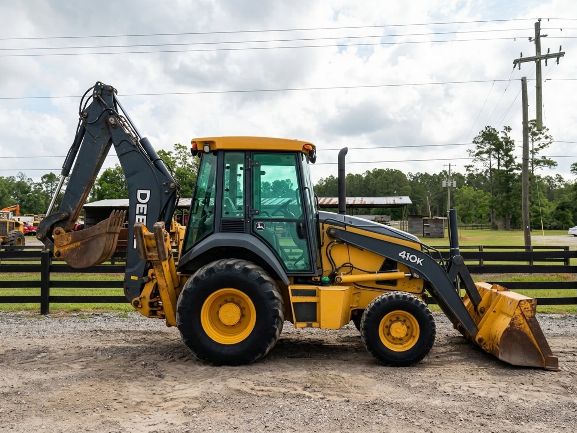 2012 JOHN DEERE 410K — photo 1